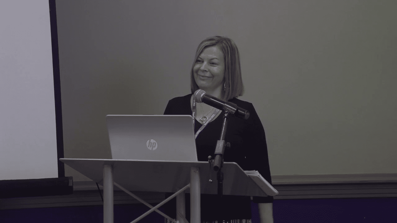 Brenda Elizabeth at the podium at StaarCon 2022