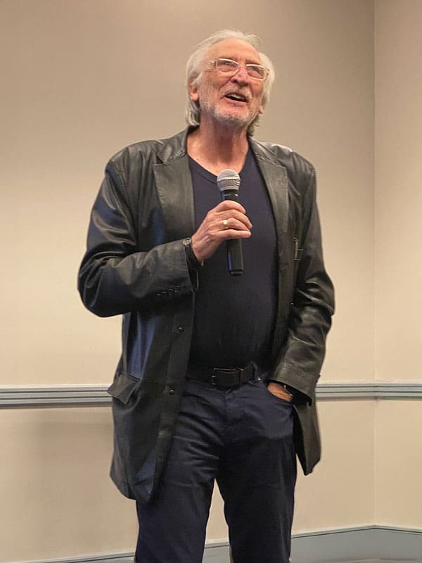 Ciro Marchetti holding the mic at StaarCon.
