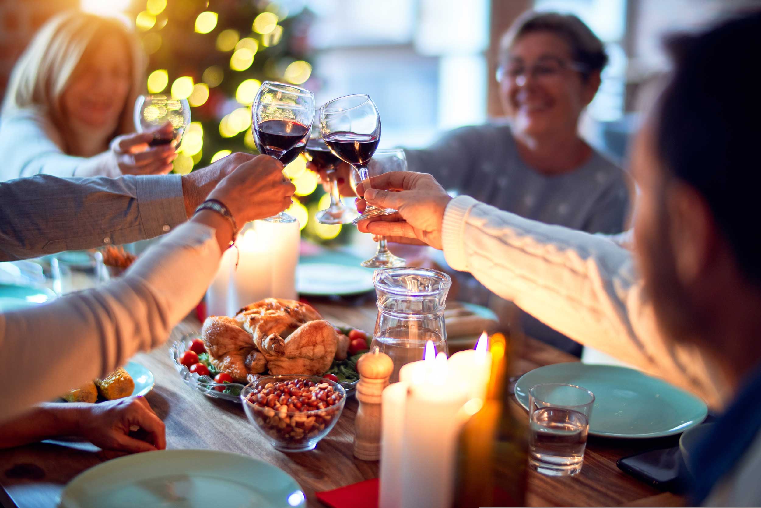 People at dinner making a toast