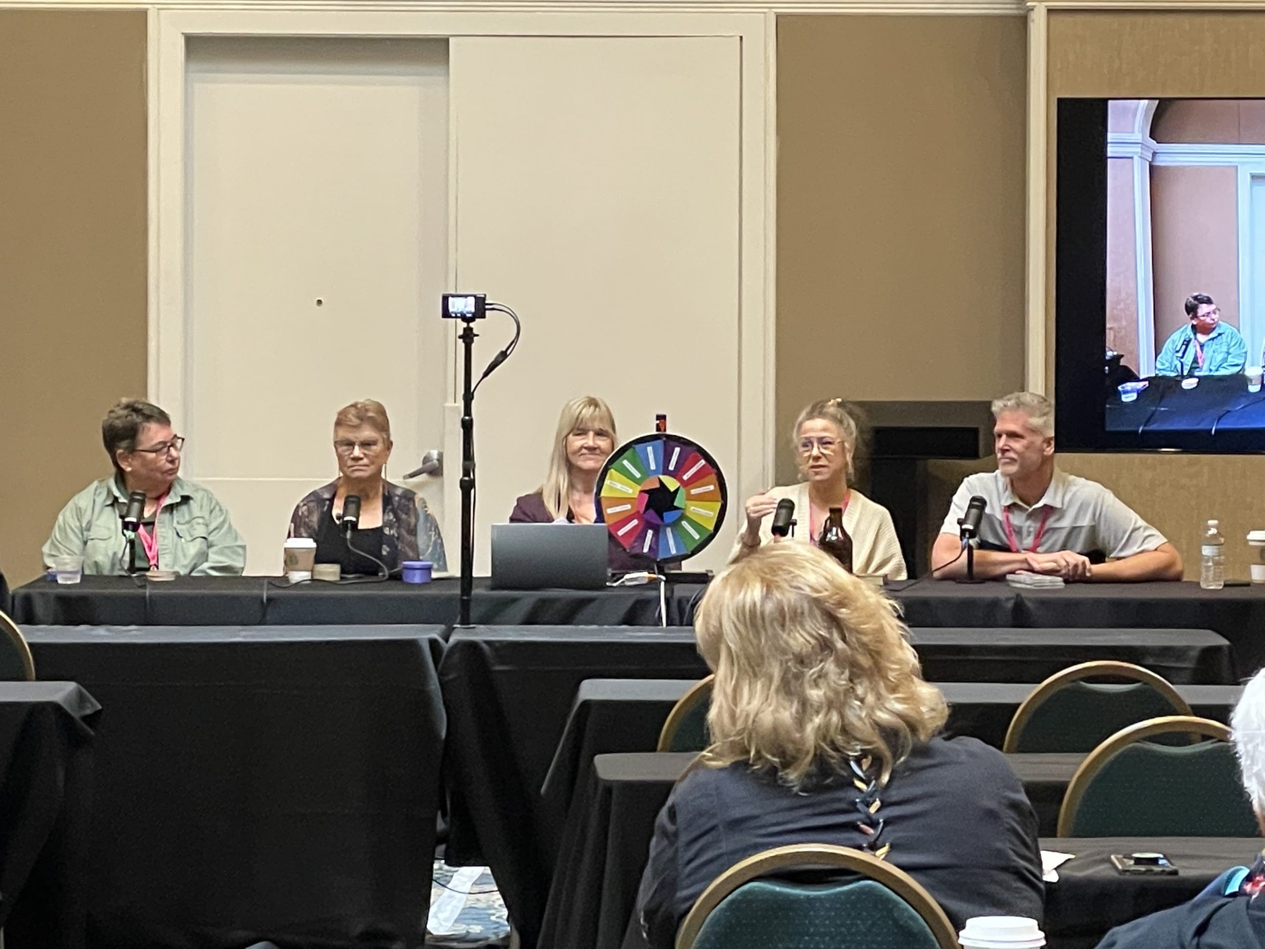 Mary Ellen Collins hosts the Wheel of Fortune Divination Panel, L to R Beverly Frable, Hattie Parker, Mary Ellen Collins, Michelle Barries, Mitchell Osborn.