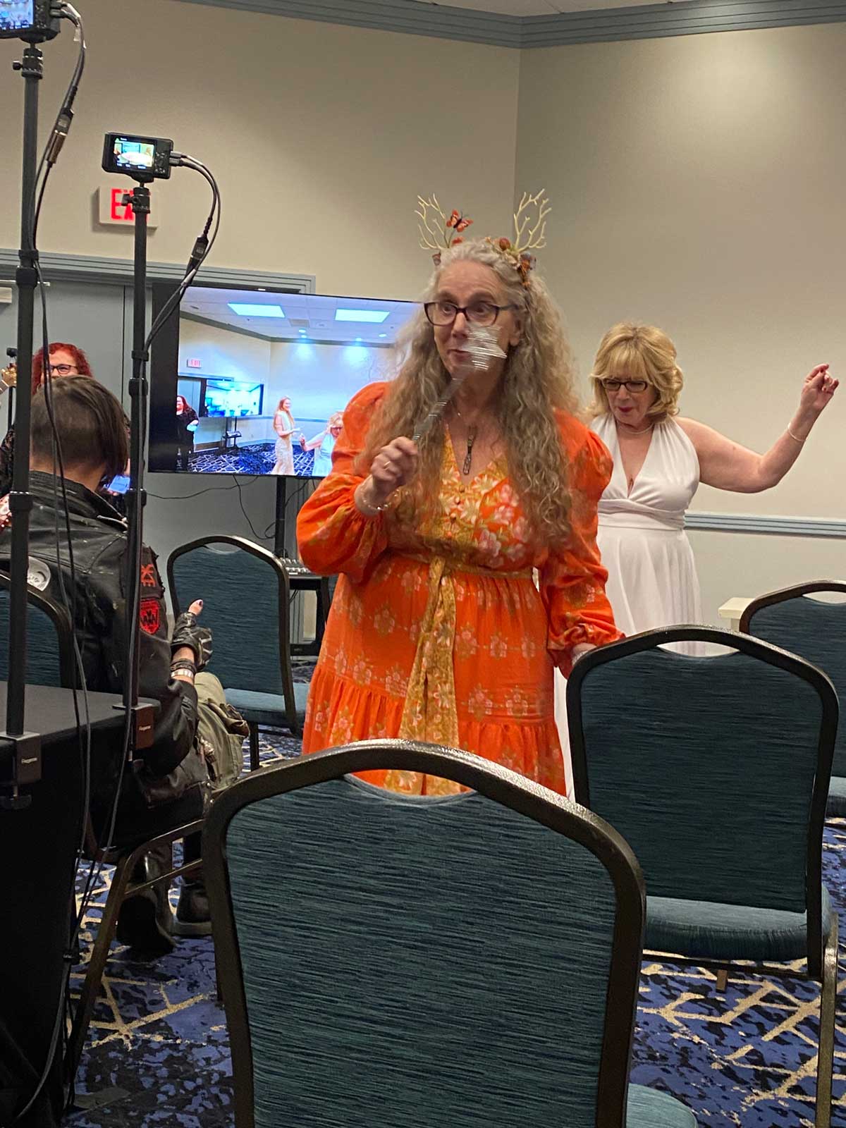 Christiana in the Opening Ceremony of StaarCon 2025.